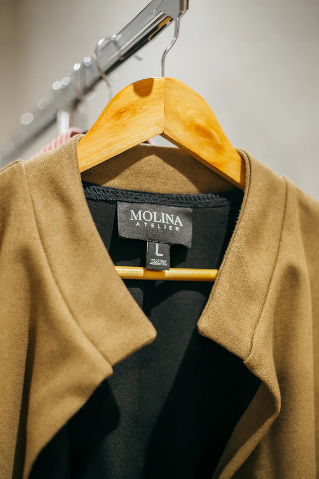 Molina Atelier label stitched inside the collar of Ale Sergi jacket