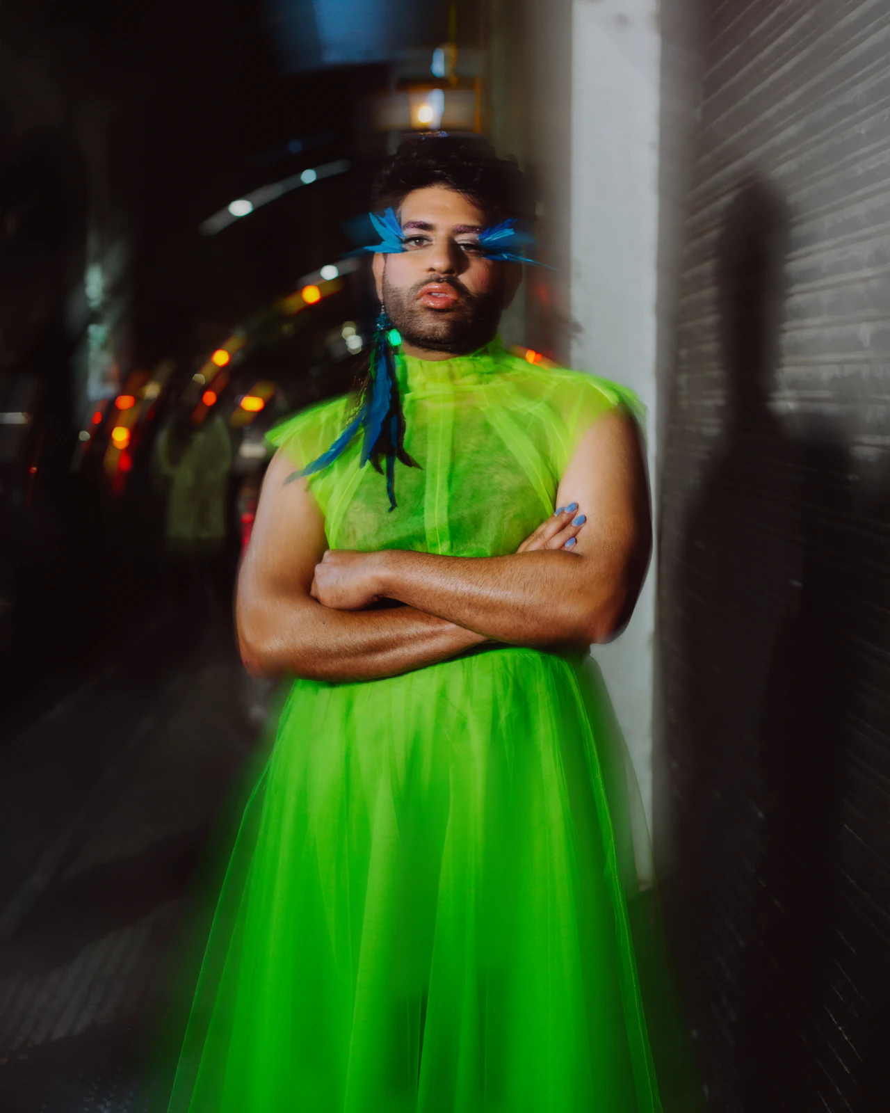 Night portrait of Alok V Menon wearing the green tulle bodice by Atelier Molina