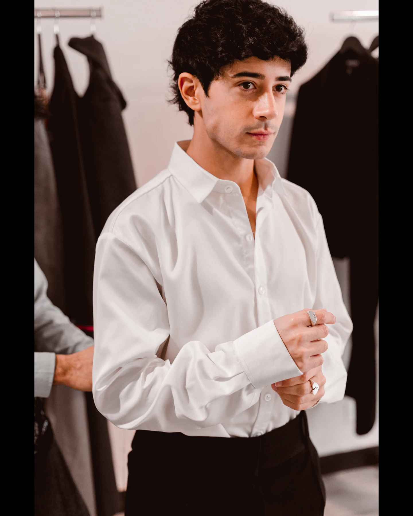 Kevsho wearing the pure white Italian cotton shirt at the Atelier Molina atelier in Buenos Aires